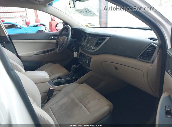 KM8J3CA48GU100294 2016 HYUNDAI TUCSON White Widok wnętrza z przodu
