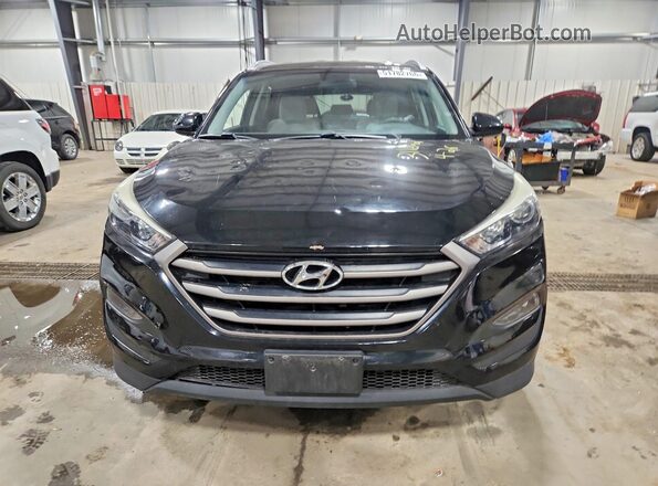 KM8J3CA48GU101302 2016 HYUNDAI TUCSON Black Դիմացի տեսք