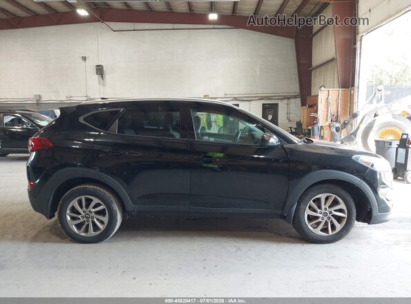 KM8J3CA48JU809332 2018 HYUNDAI TUCSON Черный Вид задней части салона