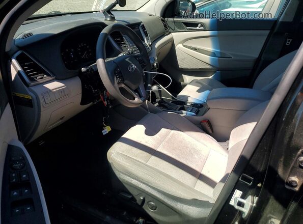 KM8J3CA49HU516050 2017 HYUNDAI TUCSON Black Front interior view