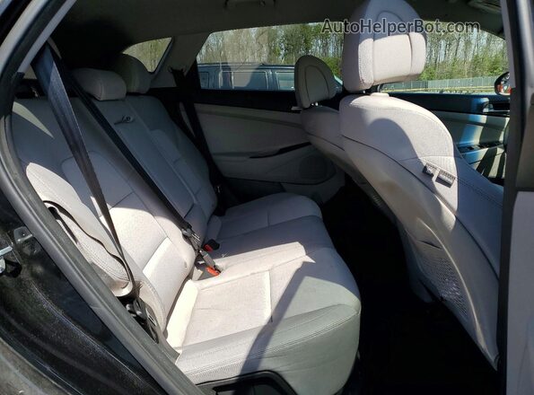KM8J3CA49HU516050 2017 HYUNDAI TUCSON Black Rear interior view