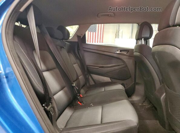 KM8J3CA49JU775188 2018 HYUNDAI TUCSON Blue Սալոնի հետևի տեսք