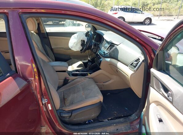 KM8J3CA4XGU186952 2016 HYUNDAI TUCSON Red Widok wnętrza z przodu