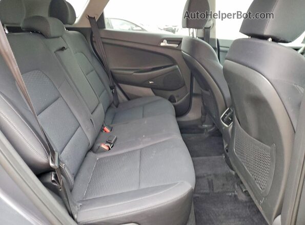 KM8J3CAL0KU008600 2019 HYUNDAI TUCSON Gray Rear interior view