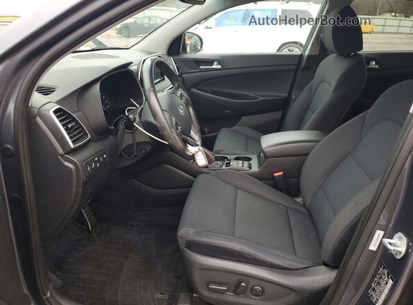 KM8J3CAL0KU008600 2019 HYUNDAI TUCSON Gray Front interior view