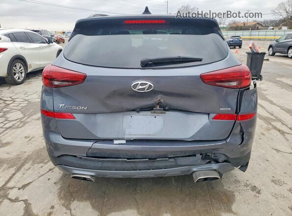 KM8J3CAL0KU008600 2019 HYUNDAI TUCSON Gray Rear view