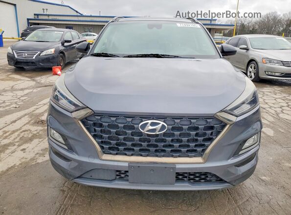 KM8J3CAL0KU008600 2019 HYUNDAI TUCSON Gray Front view