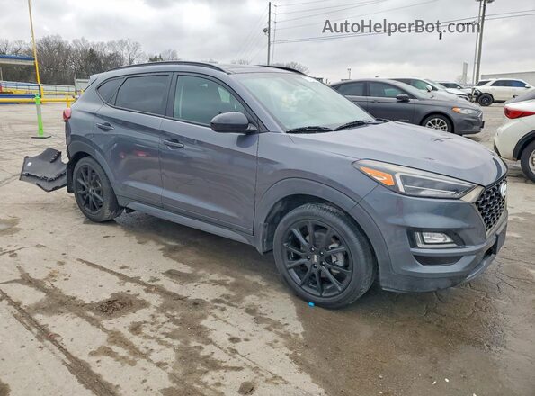 KM8J3CAL0KU008600 2019 HYUNDAI TUCSON Gray Front right