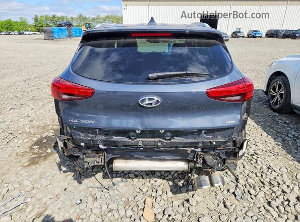 KM8J3CAL0KU030712 2019 HYUNDAI TUCSON Gray უკანა ხედი