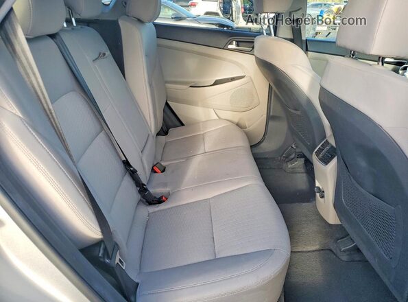 KM8J3CAL0MU350244 2021 HYUNDAI TUCSON Silver უკანა სალონის ხედი