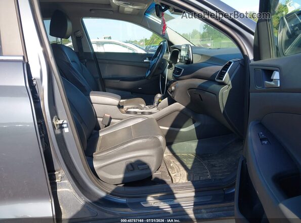 KM8J3CAL1KU071415 2019 HYUNDAI TUCSON Pewter წინა სალონის ხედი