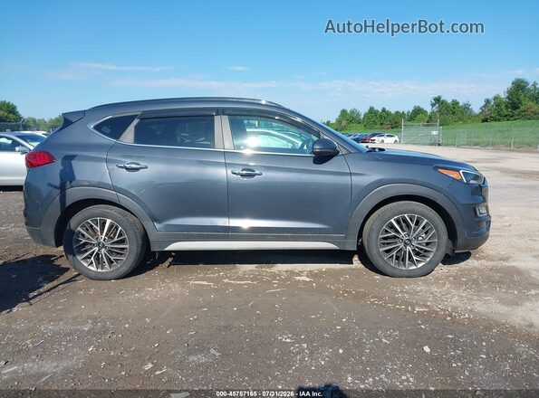KM8J3CAL1KU071415 2019 HYUNDAI TUCSON Pewter უკანა სალონის ხედი