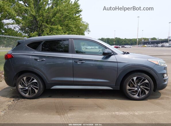 KM8J3CAL1MU410595 2021 HYUNDAI TUCSON Gray Widok wnętrza z tyłu