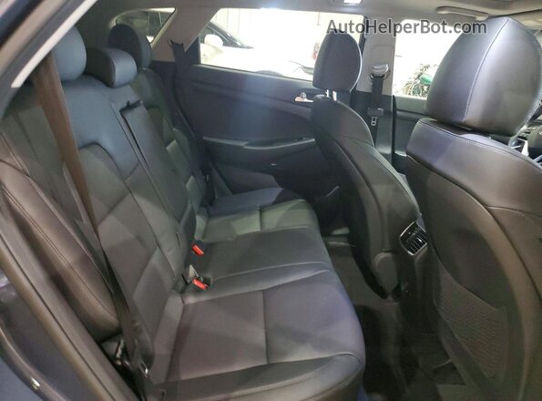 KM8J3CAL2KU048788 2019 HYUNDAI TUCSON Blue Rear interior view