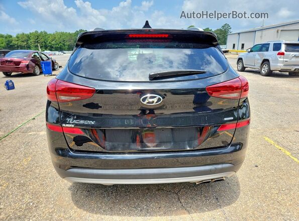 KM8J3CAL2MU283064 2021 HYUNDAI TUCSON Black Հետևի տեսք
