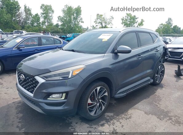 KM8J3CAL3KU040280 2019 HYUNDAI TUCSON Gray წინა მარცხენა ხედი სამი მეოთხედიდან