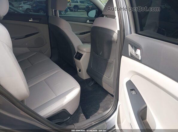 KM8J3CAL3KU040280 2019 HYUNDAI TUCSON Gray VIN კოდის სტიკერის ხედი