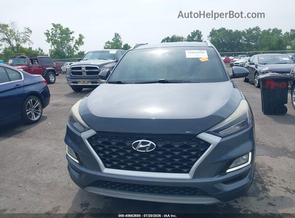KM8J3CAL3KU040280 2019 HYUNDAI TUCSON Gray უკანა სალონის ხედი