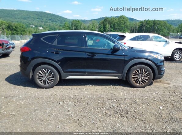 KM8J3CAL3KU928172 2019 HYUNDAI TUCSON Black Սալոնի հետևի տեսք