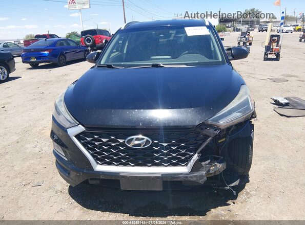 KM8J3CAL3KU953427 2019 HYUNDAI TUCSON Черный Вид задней части салона