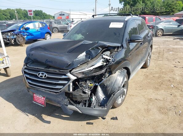 KM8J3CAL4JU694235 2018 HYUNDAI TUCSON Black Front view