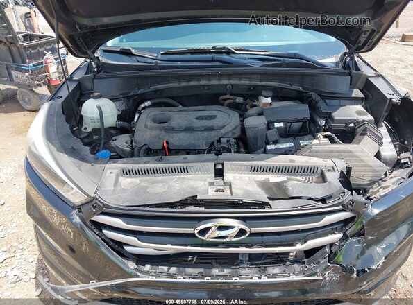 KM8J3CAL4JU746706 2018 HYUNDAI TUCSON Black Rear view