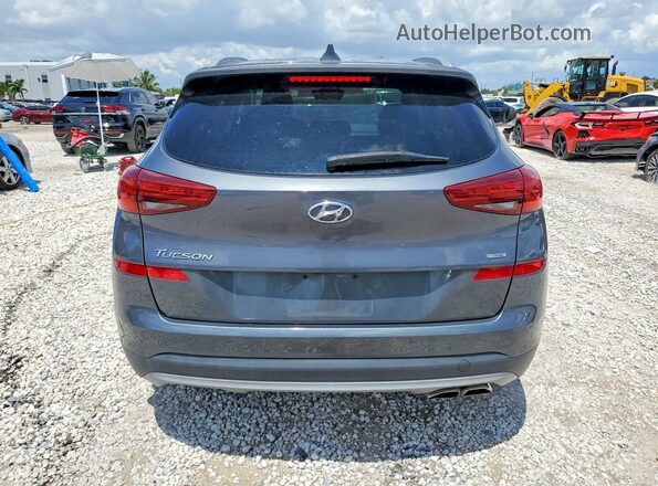 KM8J3CAL4KU884599 2019 HYUNDAI TUCSON Gray Հետևի տեսք