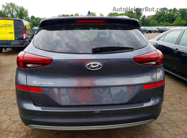 KM8J3CAL5KU978152 2019 HYUNDAI TUCSON Gray Rear view