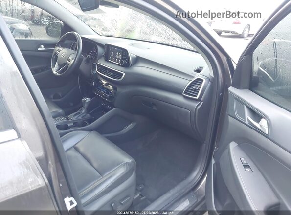 KM8J3CAL6LU166957 2020 HYUNDAI TUCSON Коричневый Вид салона спереди