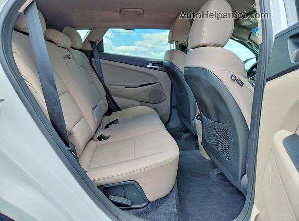 KM8J3CAL7KU058023 2019 HYUNDAI TUCSON White Вид задньої частини салону