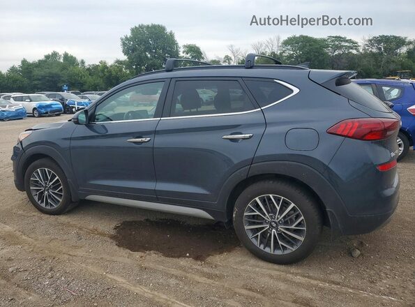 KM8J3CAL8MU331974 2021 HYUNDAI TUCSON Gray Trasero izquierdo