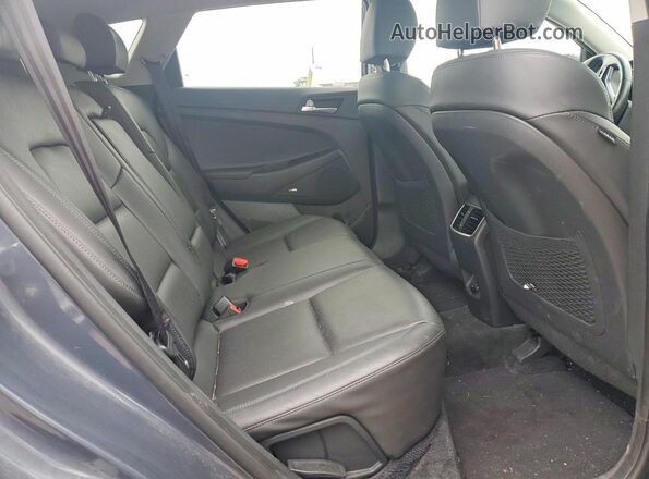 KM8J3CAL8MU331974 2021 HYUNDAI TUCSON Gray Vista interior trasera