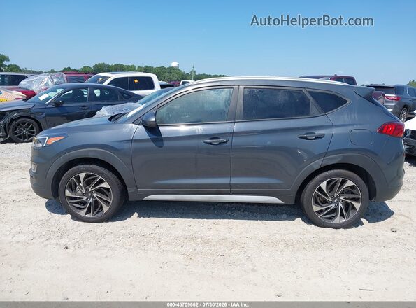 KM8J3CAL8MU401327 2021 HYUNDAI TUCSON Blue Vista interior trasera