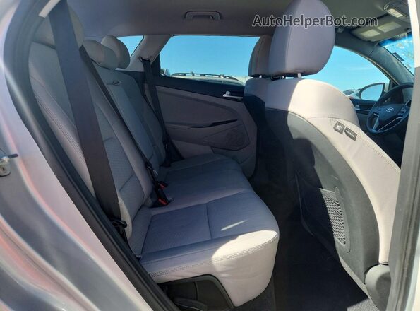 KM8J3CAL9KU844907 2019 HYUNDAI TUCSON Silver უკანა სალონის ხედი