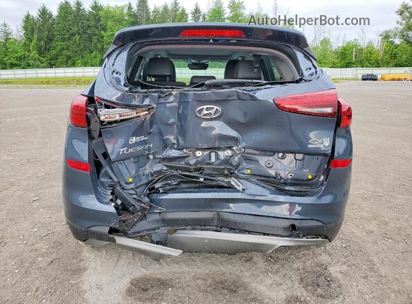 KM8J3CAL9MU384408 2021 HYUNDAI TUCSON Gray უკანა ხედი