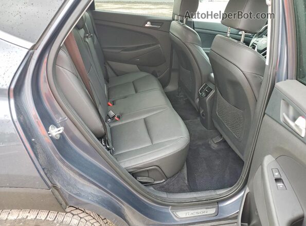 KM8J3CAL9MU384408 2021 HYUNDAI TUCSON Gray უკანა სალონის ხედი