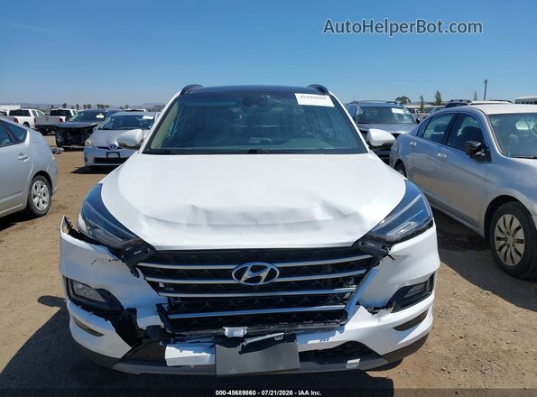 KM8J3CAL9MU394291 2021 HYUNDAI TUCSON White Widok wnętrza z tyłu
