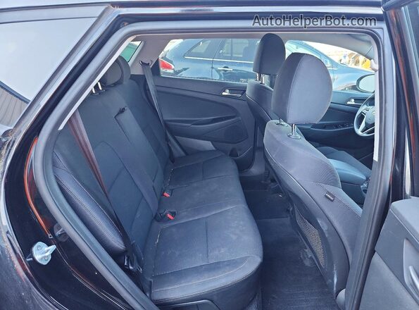 KM8J3CALXKU933885 2019 HYUNDAI TUCSON Black Widok wnętrza z tyłu