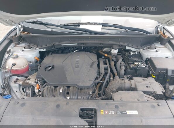 KM8JB3AE1NU080043 2022 HYUNDAI TUCSON Silver Rear view