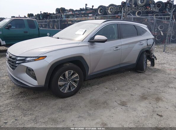 KM8JBCA11PU117379 2023 HYUNDAI TUCSON HYBRID Silver Vista tres cuartos delantera izquierda