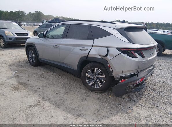 KM8JBCA11PU117379 2023 HYUNDAI TUCSON HYBRID Silver Trasero izquierdo