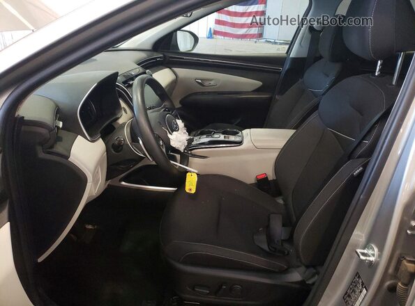 KM8JBCA16PU093063 2023 HYUNDAI TUCSON Silver Front interior view