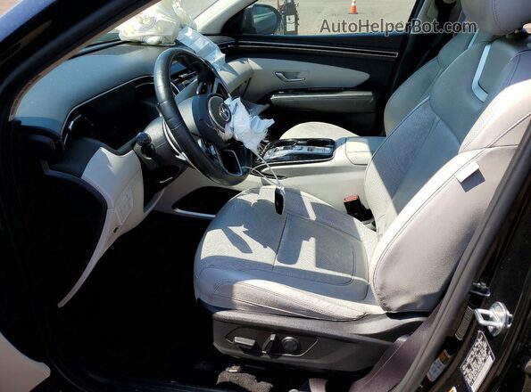 KM8JECA19NU033962 2022 HYUNDAI TUCSON Черный Вид салона спереди