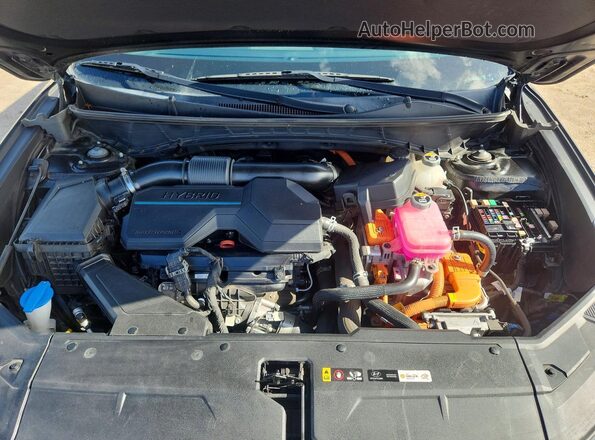 KM8JFCA11NU073904 2022 HYUNDAI TUCSON Black Vista del compartimento del motor