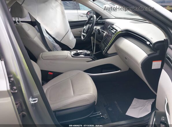 KM8JFCA13PU110986 2023 HYUNDAI TUCSON HYBRID Silver Front interior view