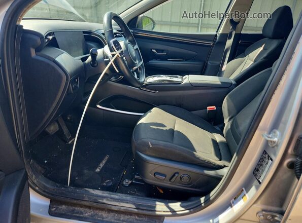 KM8JFCA19NU054565 2022 HYUNDAI TUCSON Silver Front interior view