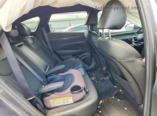 KM8JFCAE9NU152305 2022 HYUNDAI TUCSON Charcoal Vista interior trasera