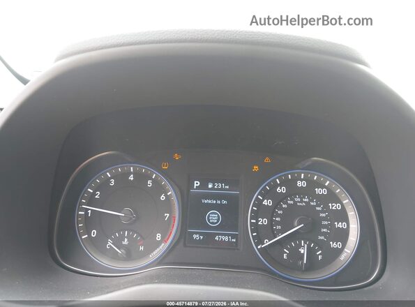 KM8K2CAA7LU457134 2020 HYUNDAI KONA Orange Rear seats view