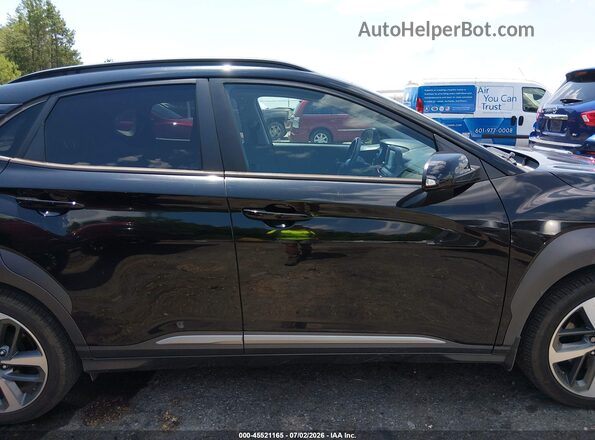 KM8K33A56MU654880 2021 HYUNDAI KONA Black Widok wnętrza z tyłu