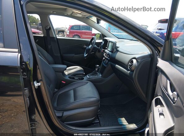 KM8K33A56MU654880 2021 HYUNDAI KONA Black Widok wnętrza z przodu
